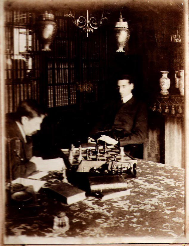 Donad BEARMAN and Thomas STUTCHBURY in the library at 8 Tudor Road