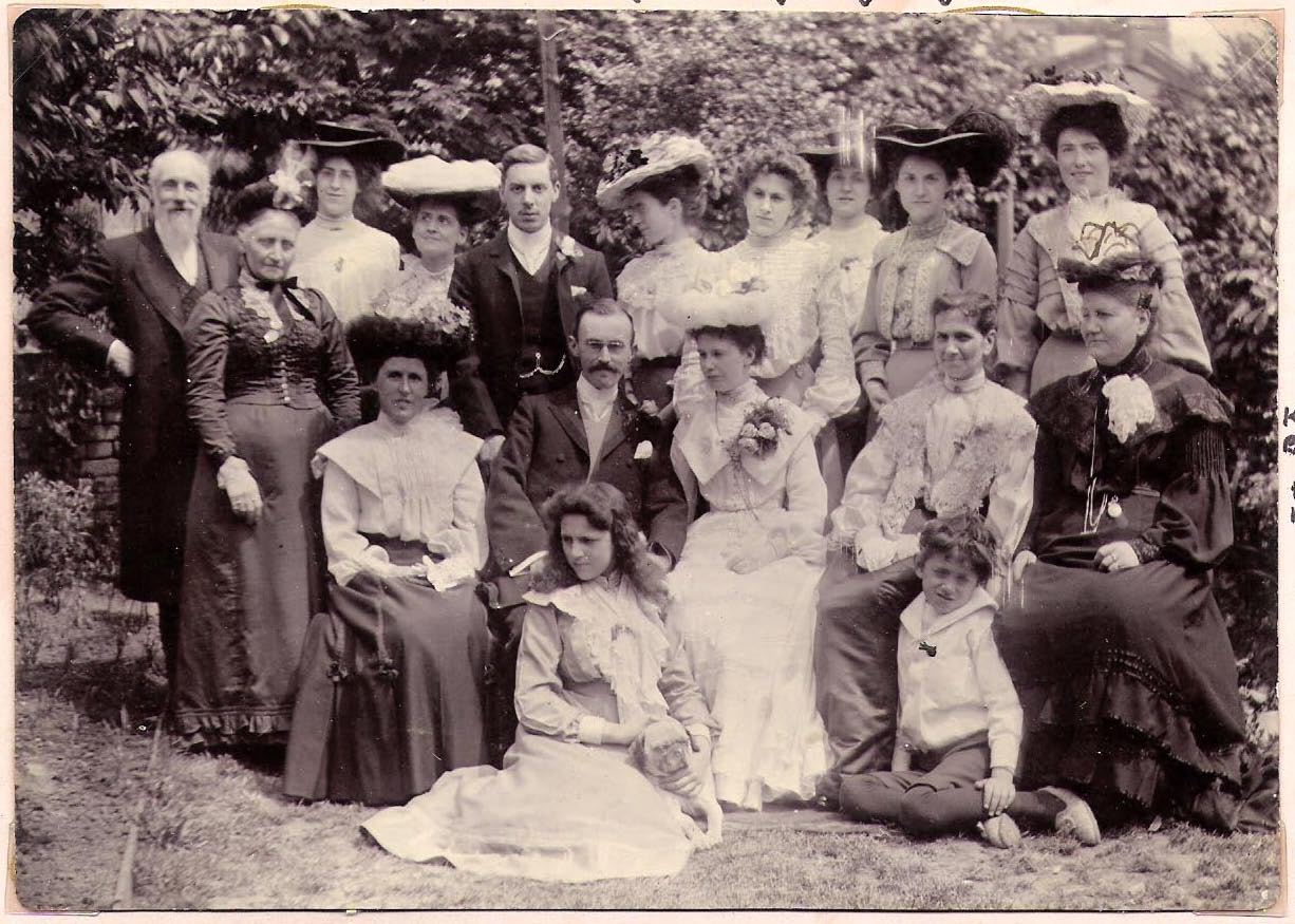 Rhoda HOWSON and Ernest SOUTHERNWOOD’s wedding. Keturah BEARMAN, sitting far right, Hilda BEARMAN back row 2nd left, Kate BEARMAN, 5th left, looking away as usual, then Emily HOWSON, Elsie BEARMAN, and Edith BEARMAN, Rhoda HOWSON, née SANDELL is sitting next to Keturah