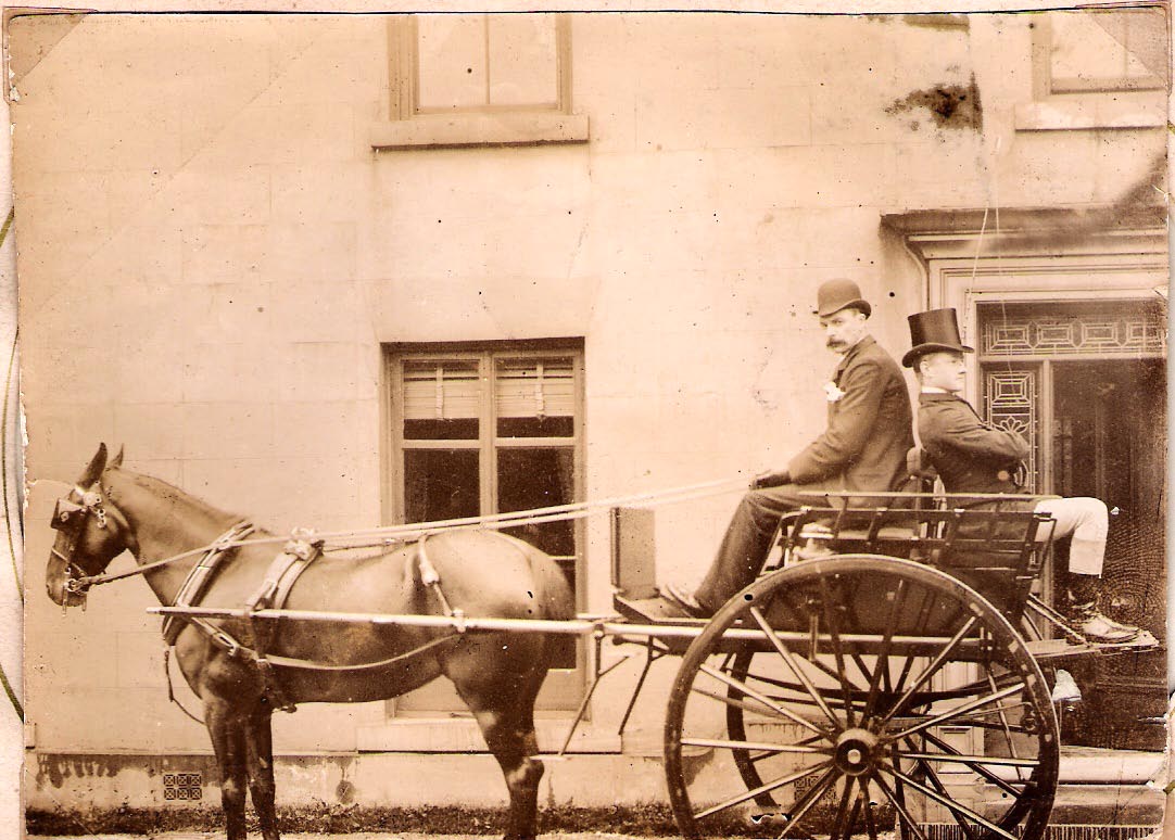 Robert John FARMER with groom sitting on back of the trap